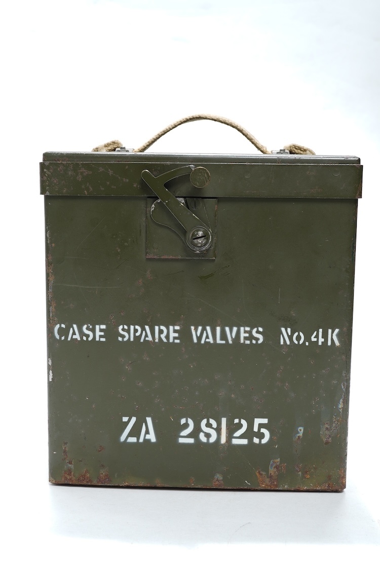 A collection of primarily 20th century military badges, lapel badges, shoulder titles, and other related ephemera, including seventeen military cap badges, cloth badges, ARP badges, etc., together with a military tin box